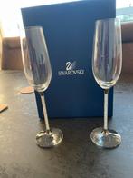 Swarovski champagneglazen, Ophalen