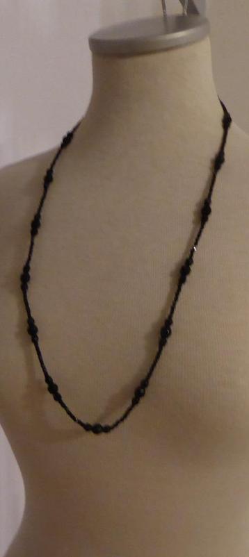 Lange zwarte ketting/ Als nieuw beschikbaar voor biedingen