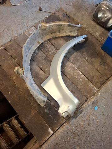 Taille voorkant en spatbordbehuizing voor Suzuki Jimny 1998- beschikbaar voor biedingen