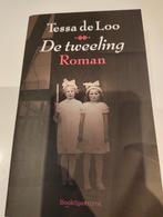 Boek de tweeling van Tessa de Loo, Ophalen of Verzenden, Gelezen, Tessa De Loo