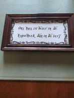 Houten kader met toffe spreuk, Enlèvement