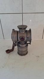 Antiek fietslamp op carbide, Ophalen