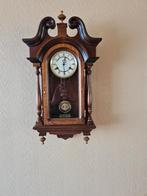 Houten wandklok, Ophalen