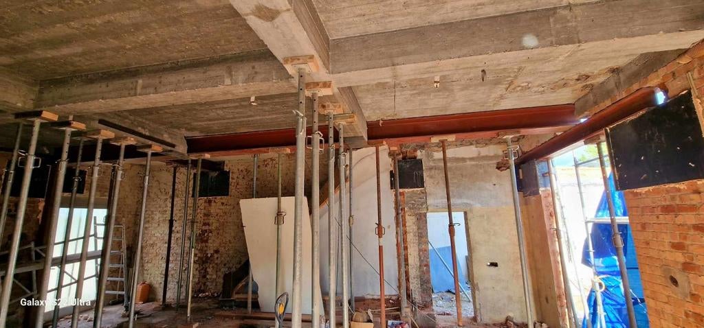 Draagmuur afbreken en poutrel steken. 0466445657