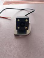 Achteruitrijcamera., Enlèvement