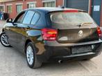 BMW 1 SERIE ✅116iA AUTOMAAT CARPLAY BENZINE GARANTIE 1 JAAR, Auto's, BMW, 4 cilinders, Zwart, 5 deurs, 100 kW