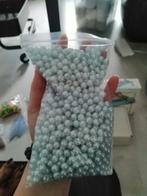 Zak licht blauwe kralen, Enlèvement