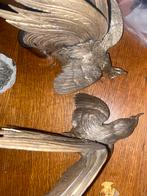 Zilveren vogels, Ophalen