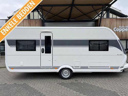 Hobby De Luxe 540 UL 2025 ENKELE BEDDEN!, Caravans en Kamperen, Caravans, tot en met 6, 1250 - 1500 kg, Rondzit, Hobby, 2 aparte bedden