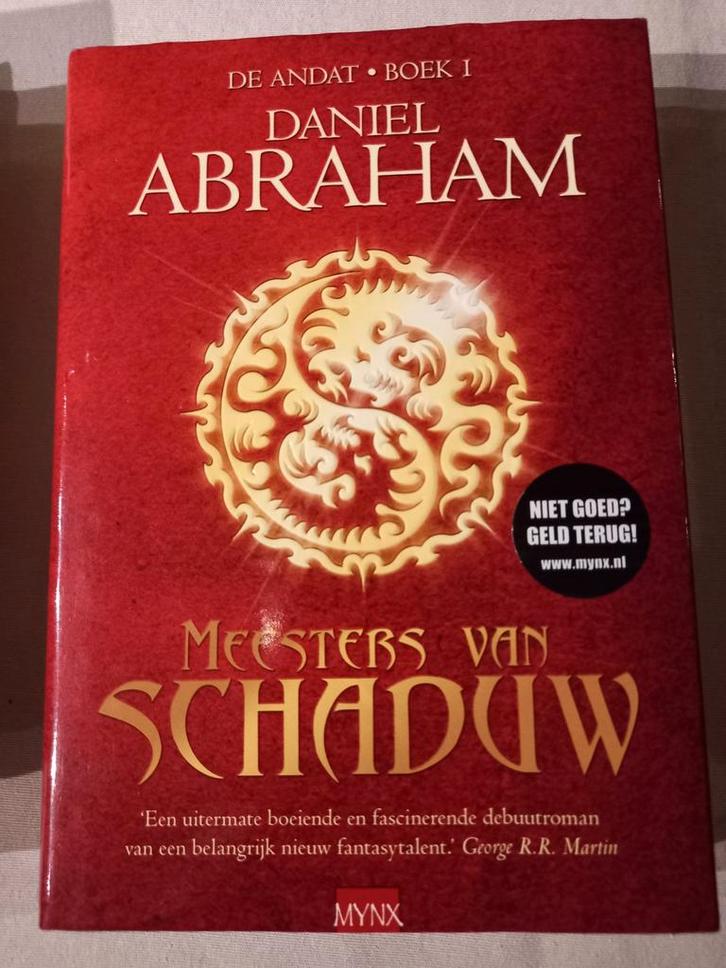 Daniel Abraham - Meesters van de schaduw, Boeken, Fantasy, Zo goed als nieuw, Ophalen of Verzenden