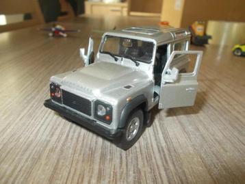 26J : Voiture miniature LAND ROVER grise 1/43 (WELLY). disponible aux enchères