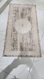 tapis tapijten  2 van die kleine, Ophalen