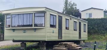 Caravan met 3 slaapkamers in een privédomein