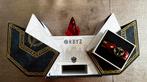 Tomorrowland 2025 - Orbyz - case incl bracelet, Ophalen of Verzenden, Zo goed als nieuw