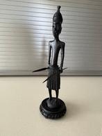 Statue africaine en bois, Enlèvement