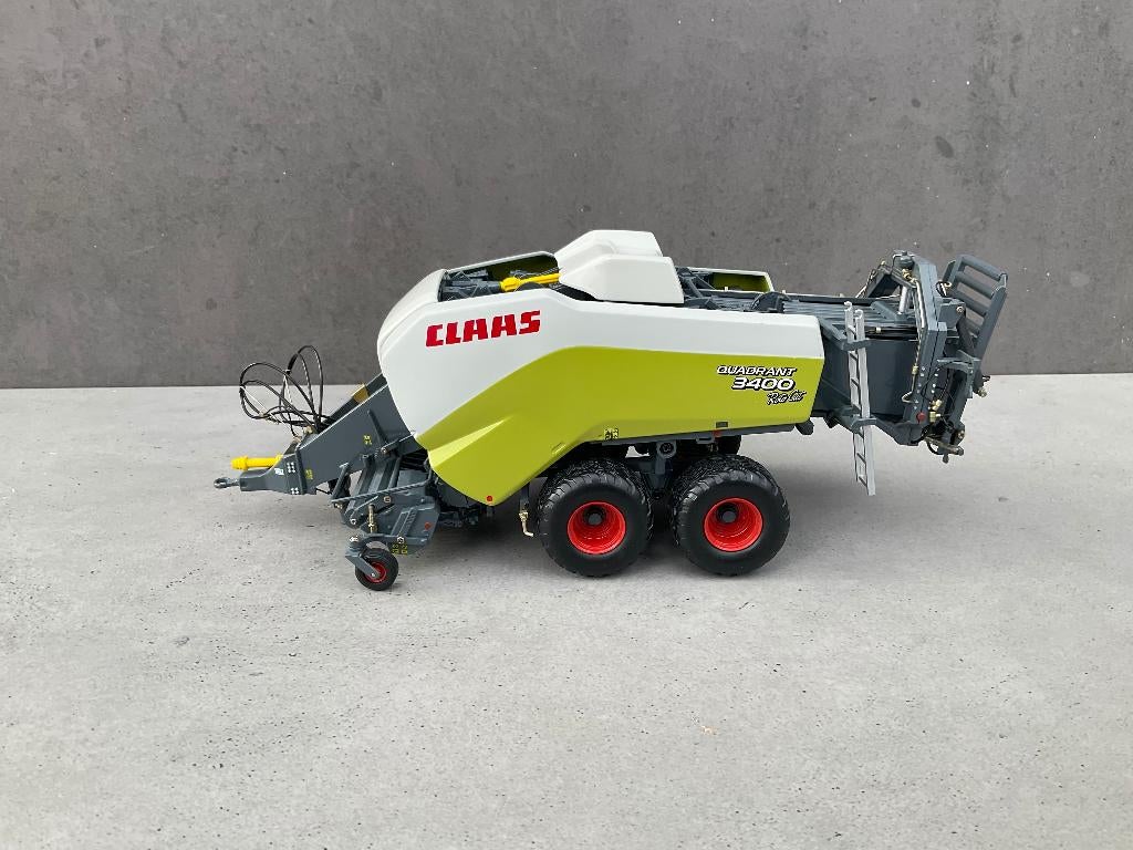 UH Claas Quadrant 3400, Hobby & Loisirs créatifs, Voitures miniatures | 1:32, Enlèvement ou Envoi, Comme neuf, Tracteur et Agriculture