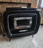 Ancien poêle à mazout de la marque Somy, Enlèvement