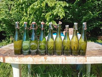 Oude vintage bierflessen brouwerij het Scheepken Eksaarde  beschikbaar voor biedingen