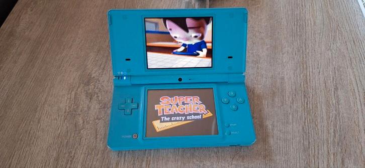Nintendo Dsi set, Games en Spelcomputers, Spelcomputers | Nintendo DS, Gebruikt, Dsi, Blauw, Met games, Ophalen of Verzenden