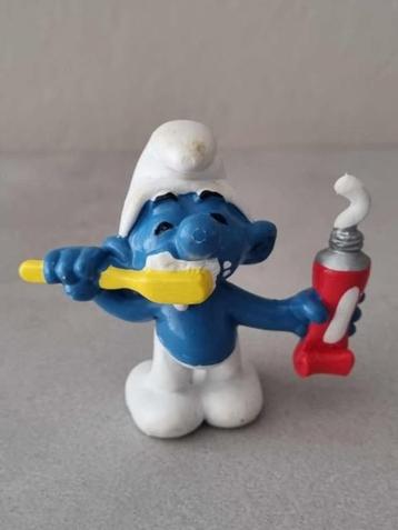 Tandenpoets smurf. beschikbaar voor biedingen