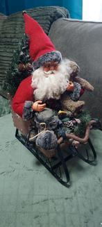 kerstman op slee breete 15cm  lengte 32 cm hoog 45cm, Ophalen of Verzenden, Gebruikt