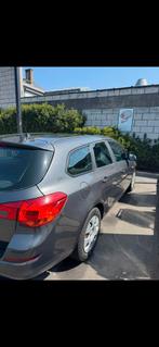 Opel Astra 2011 benzine Euro 5, Auto's, Voorwielaandrijving, Euro 5, Stof, Bedrijf