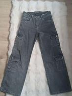 Zwarte broek met broekzakken, Ophalen