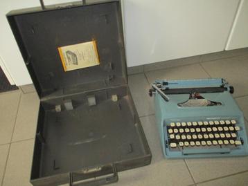 oude typmachine van 1972 met koffer , merk remington  disponible aux enchères