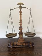 Antieke weegschaal, Ophalen