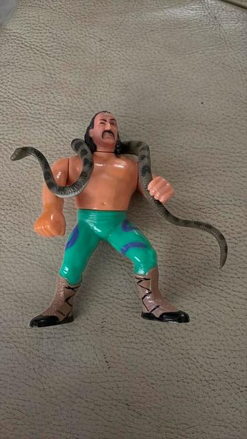 WWF vintage 1990 Jake the Snake Roberts met slang beschikbaar voor biedingen