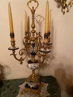 Porseleinen kandelaar, Ophalen