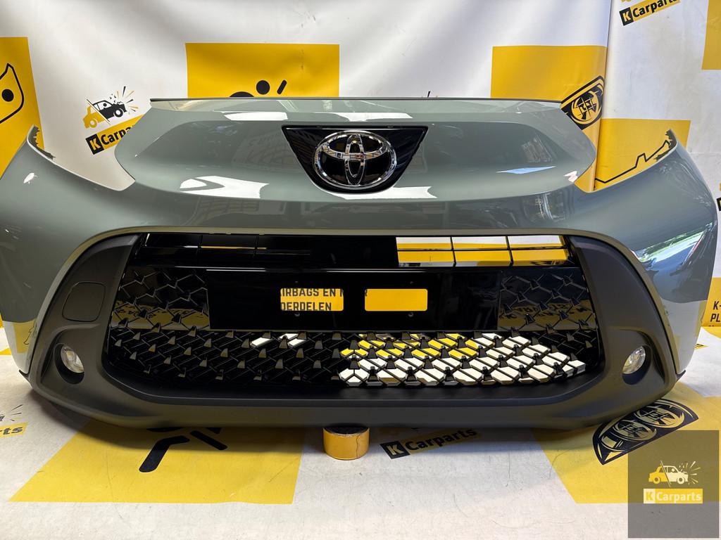 Toyota Aygo X Voorbumper origineel Compleet 52119-OH19 nieuw, Auto-onderdelen, Carrosserie, Bumper, Toyota, Voor, Gebruikt