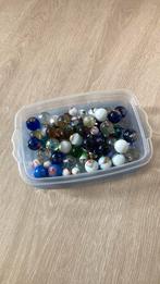 Knikkers met figuurtjes, Ophalen, Gebruikt