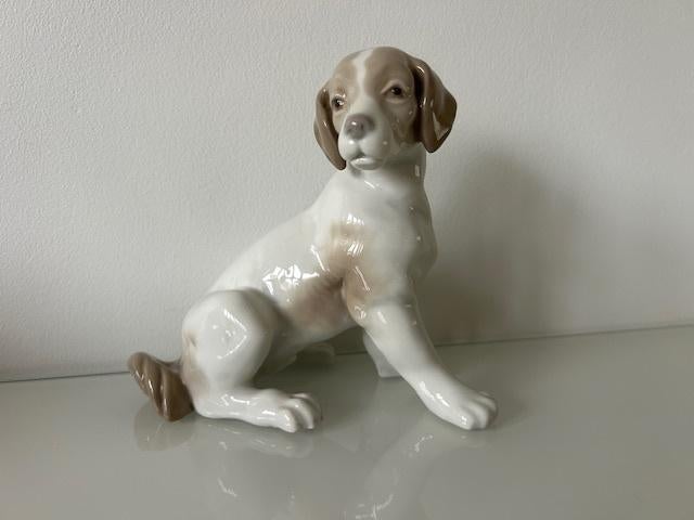 Lladro zittende jachthond, Ophalen