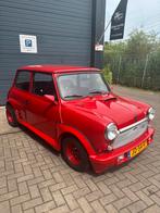 Classic mini van het bouwjaar 1982, Auto's, Mini, Voorwielaandrijving, Zwart, 4 cilinders, Leder en Stof