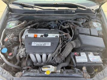 Motor van een Honda Accord beschikbaar voor biedingen