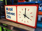 Lichtreclame met klokje van MOBIL, Ophalen