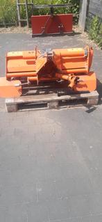 Grondfrees mini traktor, Ophalen