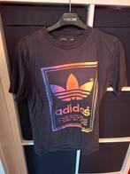 T shirt adidas maat 38 gaatje in  gedragen staat, Vêtements | Femmes, T-shirts, Enlèvement ou Envoi, Porté, Taille 38/40 (M)