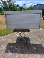 Materiaalkast, Ophalen