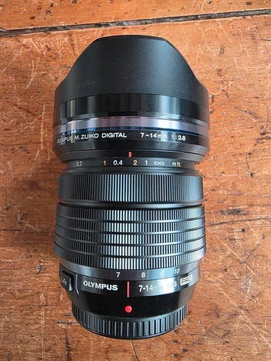 M-ZUIKO Pro 7-14mm 1:2.8 (zoom grand angle), Audio, Tv en Foto, Foto | Lenzen en Objectieven, Zo goed als nieuw, Zoom, Ophalen of Verzenden