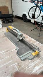 Tegel snijder, Ophalen, Gebruikt