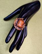 Prachtige zilveren/bronzen Art Brut ring met amber, Ophalen of Verzenden
