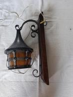 wandlamp met lantaarn, Ophalen
