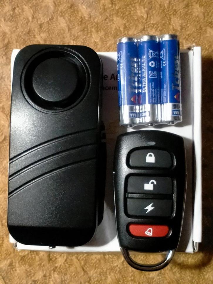 ALARM MET TRILSENSOR EN AFSTANDSBEDIENING, Fietsen en Brommers, Fietsaccessoires | Fietssloten, Nieuw, Alarm, Ophalen of Verzenden