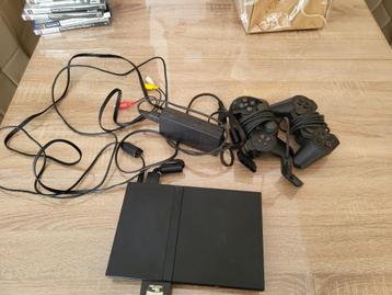 Console Sony Playstation 2 Slim Noir + 2 manettes + 7 jeux beschikbaar voor biedingen
