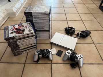 Playstation 2 Silver, 2 controllers, 2 memory cards 35 games beschikbaar voor biedingen