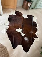 Koeienhuid, Enlèvement