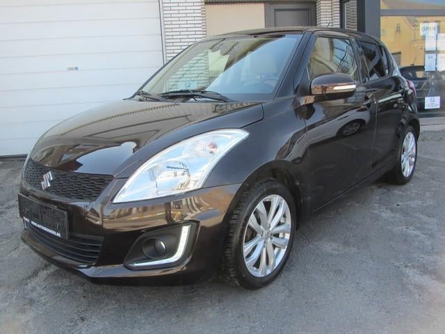Suzuki Swift 1.2i *119.000 Km* Garantie Airco PDC Leder Alu, Auto's, Voorwielaandrijving, 4 cilinders, Bruin, Parkeersensor