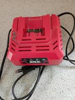 Skil lader + oplaadbare batterij   25 euro samen, Ophalen, Zo goed als nieuw